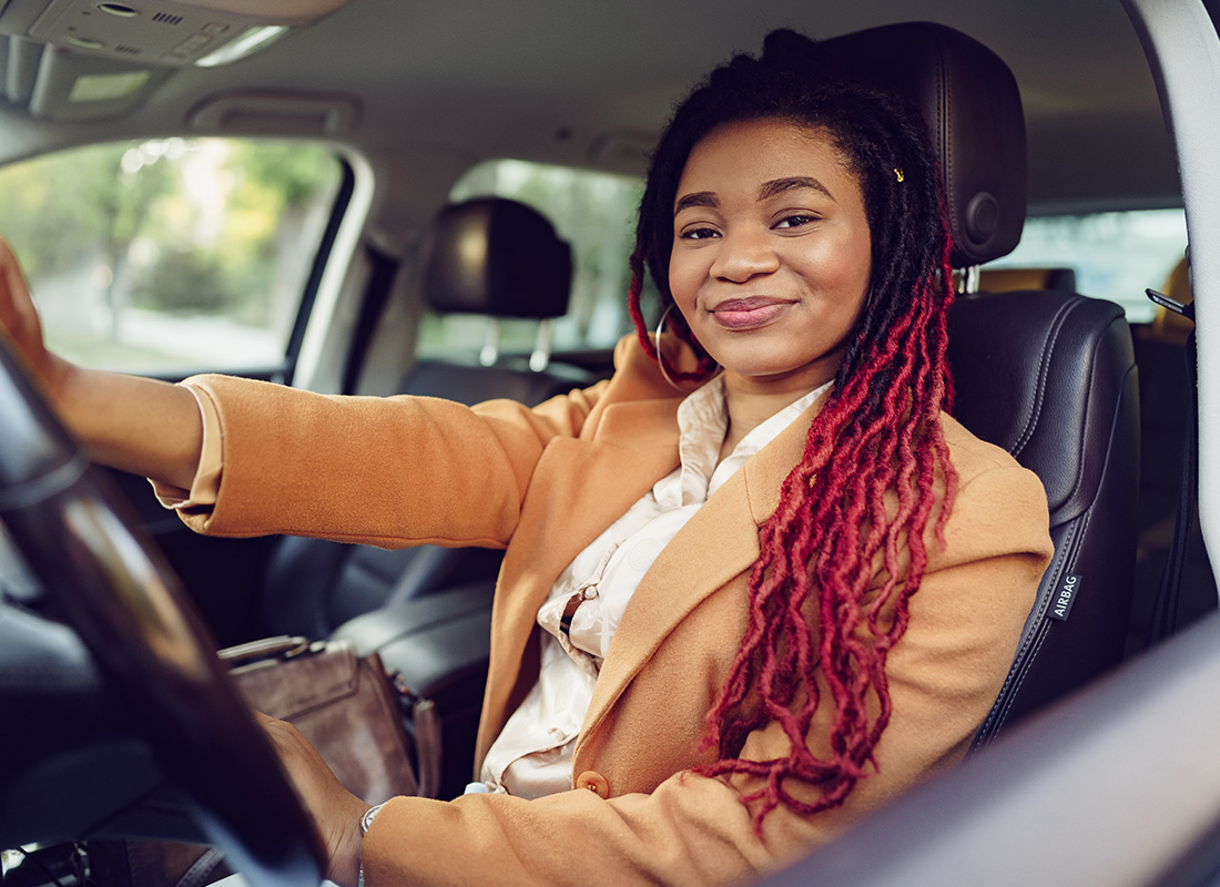 Cleburne, TX - Happy Woman Driving Her Car